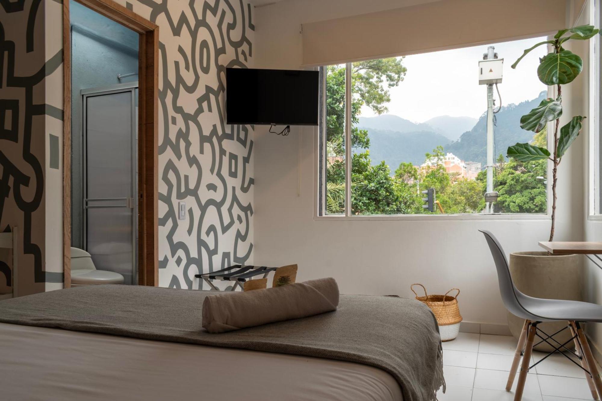 Nomadia Coliving Boutique Pensión *